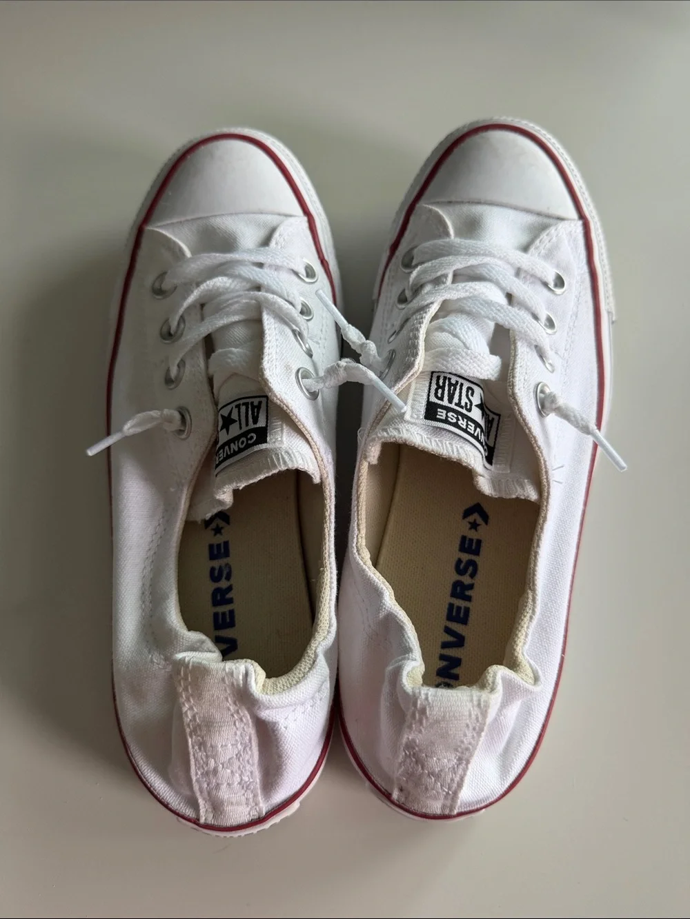 Converse White Low Top Sneakers with Red Trim